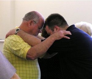 two people praying